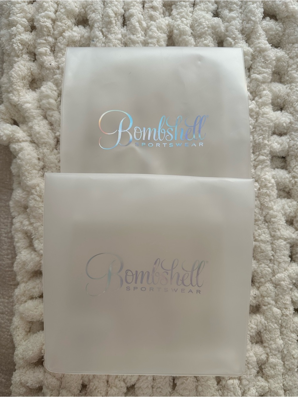 Bombshell Sportswear Frosted White Holographic Logo Pouches